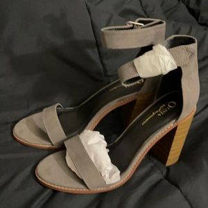 Gray suede and wood heel shoe